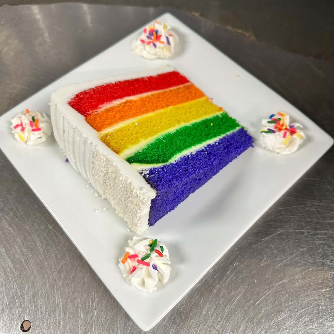 Rainbow layer cake, made in-house