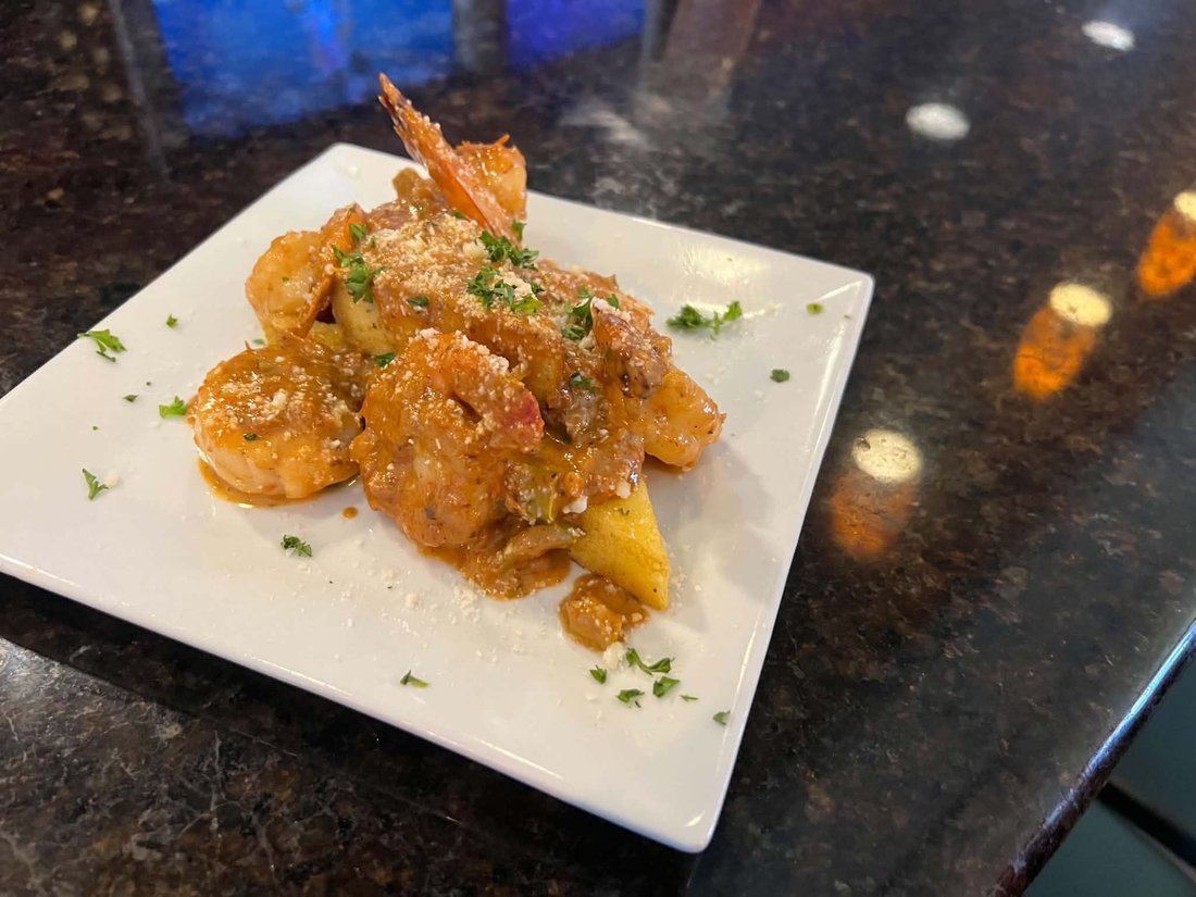 Shrimp fra diavolo over polenta